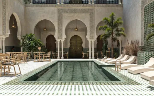 Patio de riad con piscina, arcadas y tumbonas